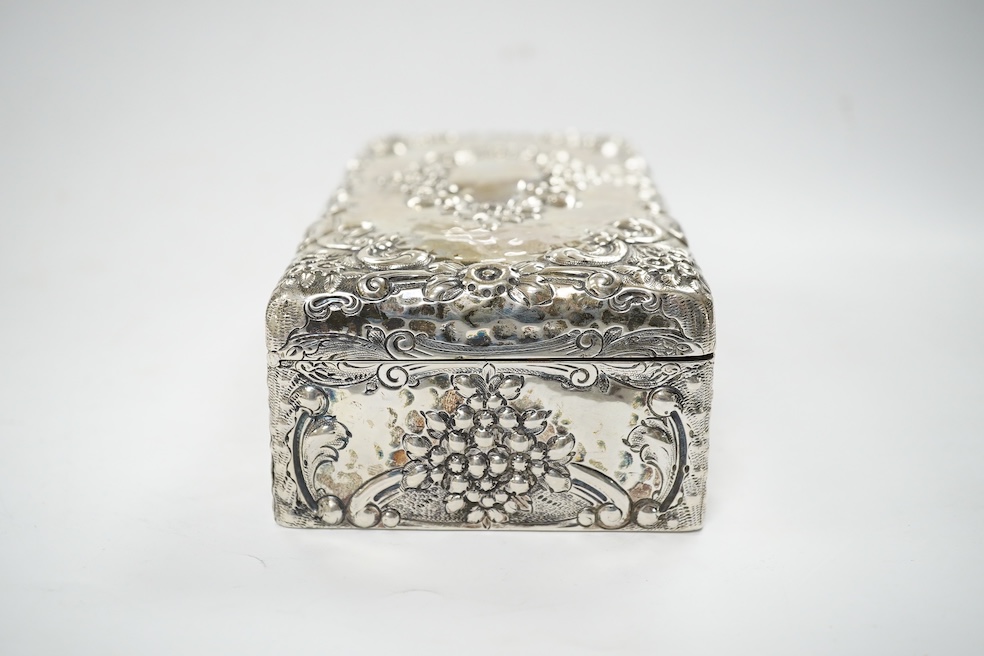 A late Victorian embossed silver rectangular trinket box (converted from a cigarette box), Joseph Braham, London, 1900, 17.5cm. Condition - fair to good